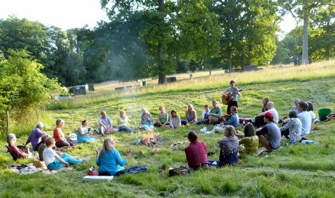 Interfaith gathering in a field