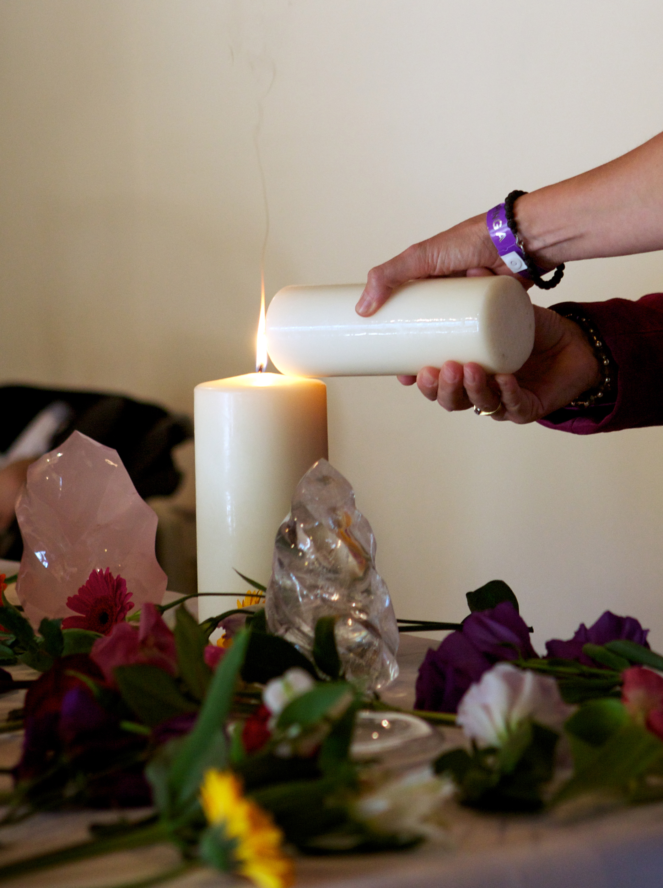 candle and crystal on altar